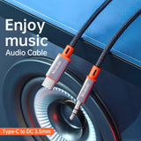 Cablu audio Mcdodo Castle (CA-0820), Type-C to Jack 3.5mm, Nylon Braided, 1.2m, negru;gri;portocaliu